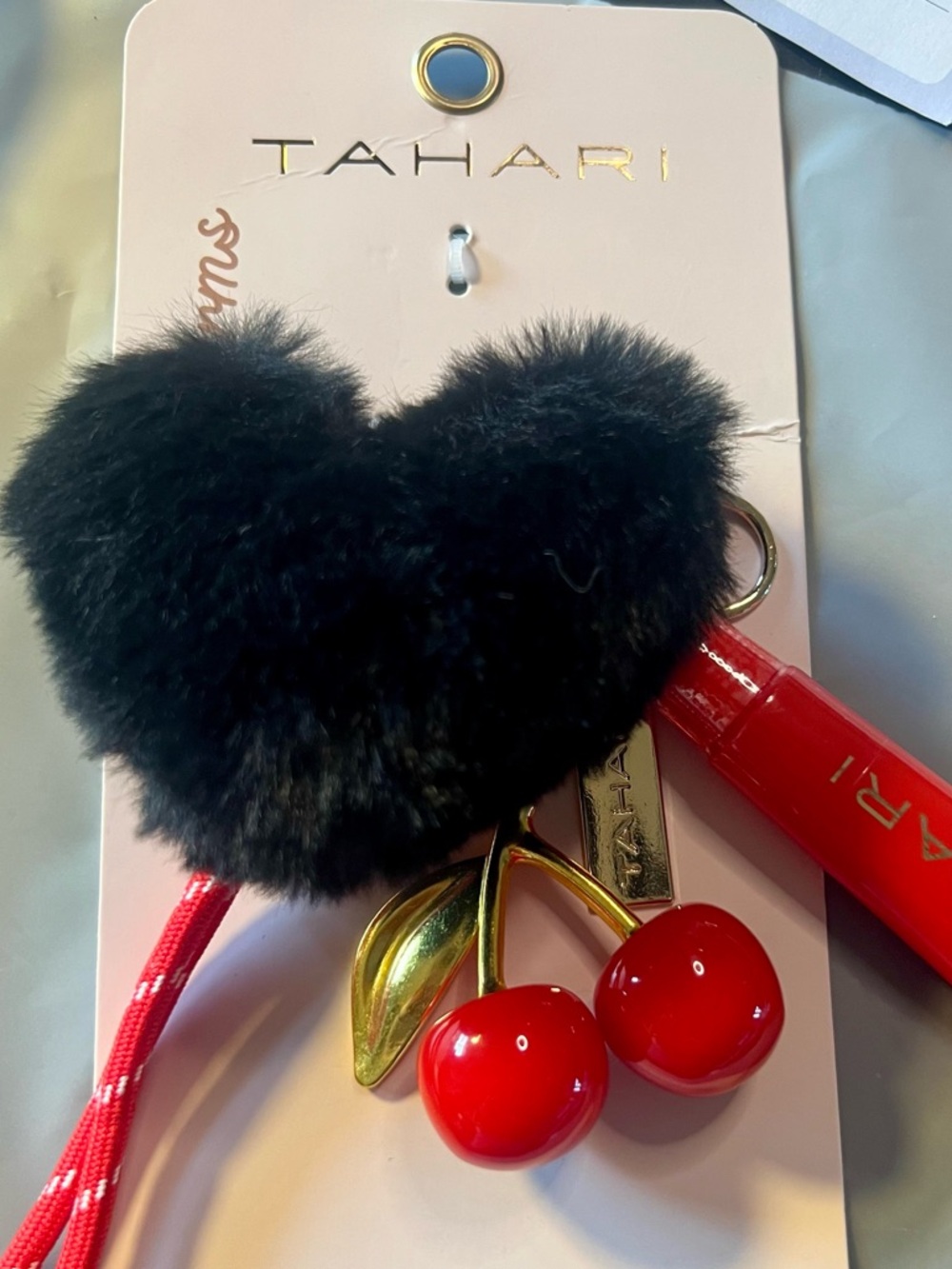 NWT Tahari Black Pom Heart with Red Cherry Key Charm with Lipgloss. Unopened